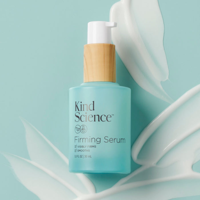 Kind Science Firming Serum product on a mint background
