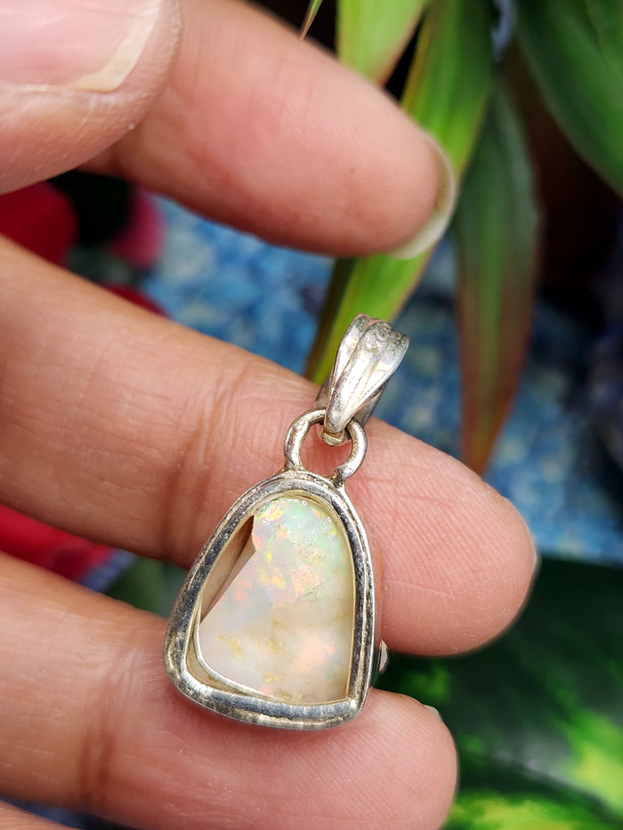 Ethiopian Opal Rough Single Stone Pendant in Silver - A Captivating Display of Nature's Brilliance