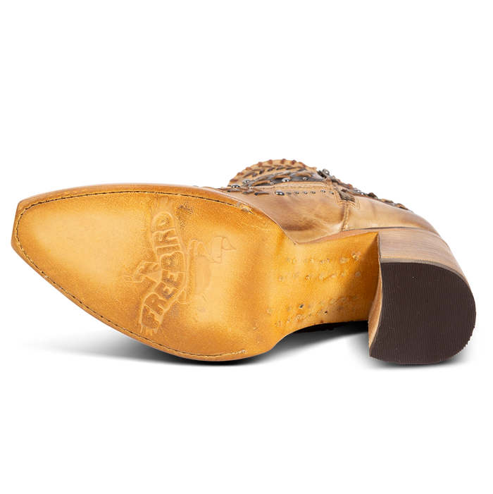 Leather sole imprinted with FREEBIRD on women's Jetson tan heeled bootie