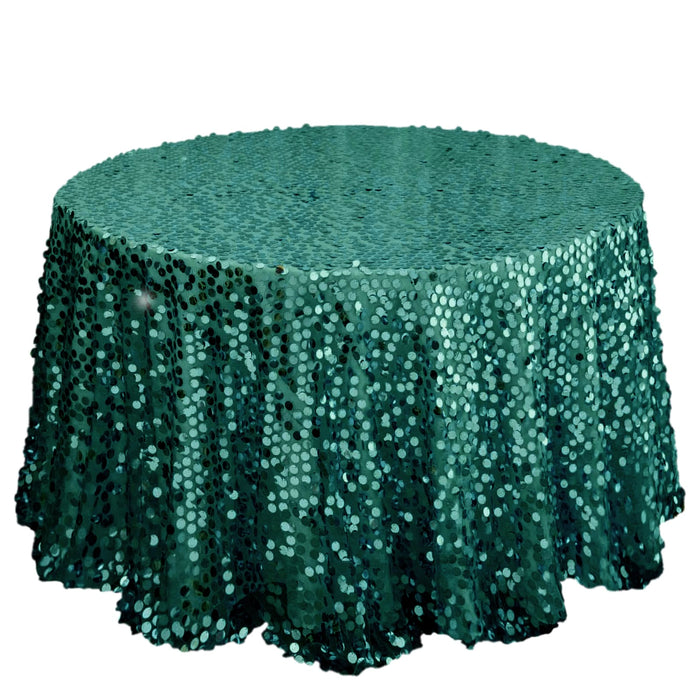 Teal sequin tablecloth on a round table