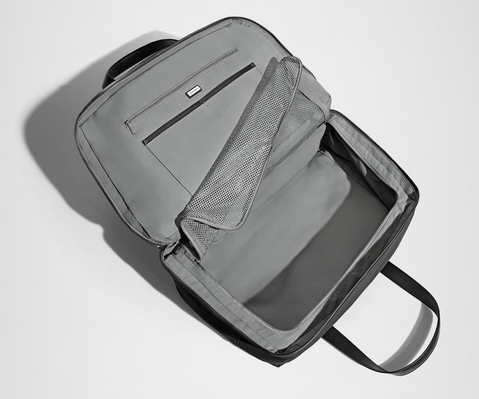 Empty Overnight Bag showing the clamshell opening and depth of the main compartment