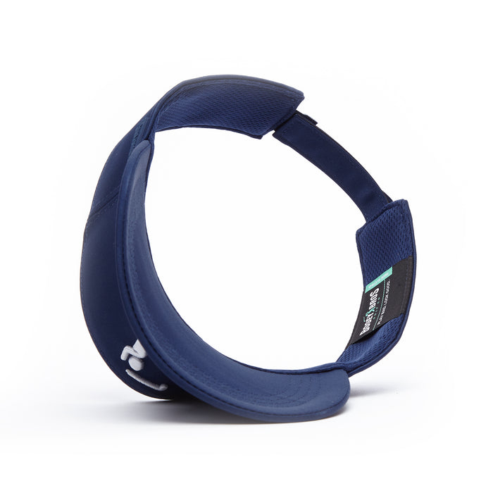 The Bogeyman Navy - Visor is a navy blue sports visor with an open top, ventilated panels, and adjustable back strap. It features black and white inner labels and a white embroidered logo on the underside of the curved brim against a plain white background.