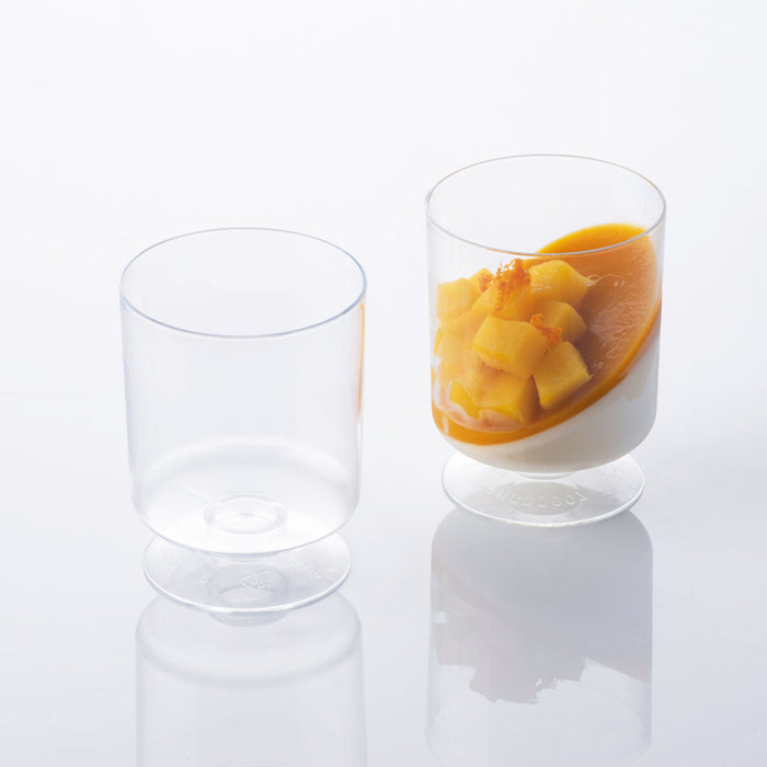 2 Cylinder Goblets with Base 5.07 oz Capacity shown with one empty and one full with white and orange pastry.
