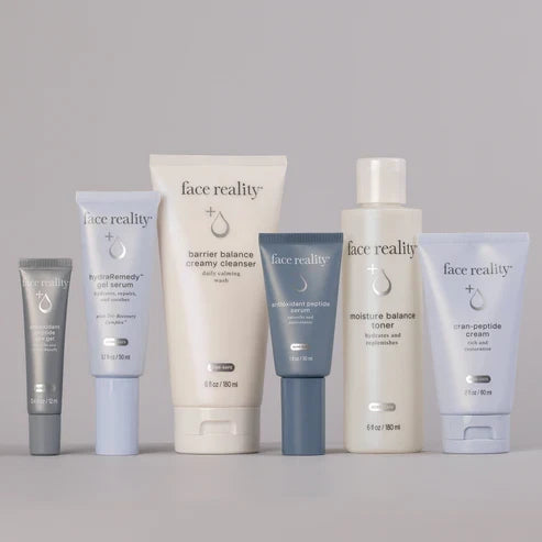 Face Reality Deluxe Age Defense Kit featuring Barrier Balance Creamy Cleanser, Moisture Balance Toner, Antioxidant Peptide Eye Gel, Antioxidant Peptide Serum, HydraRemedy Serum, and Cran-Peptide Cream to hydrate, support collagen, and improve the appearance of fine lines at The Skyn Distillery Wayzata Minnesota.