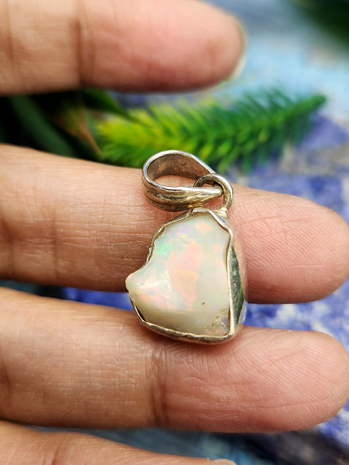 Ethiopian Opal Rough Single Stone Pendant in Silver - A Captivating Display of Nature's Brilliance