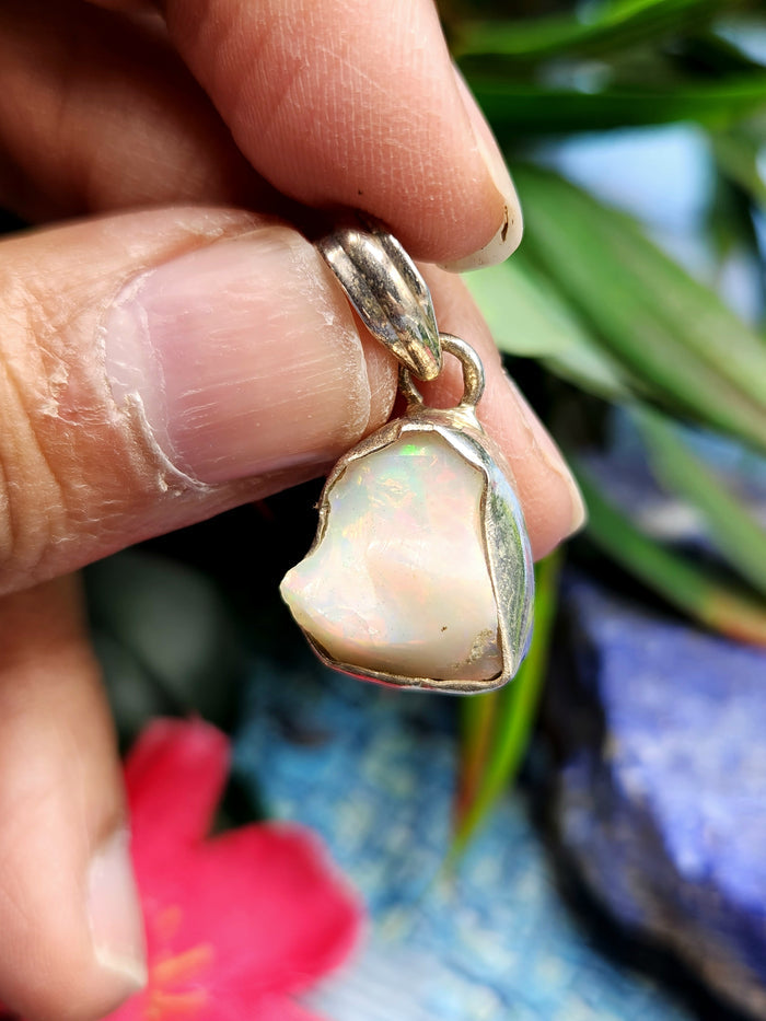 Ethiopian Opal Rough Single Stone Pendant in Silver - A Captivating Display of Nature's Brilliance