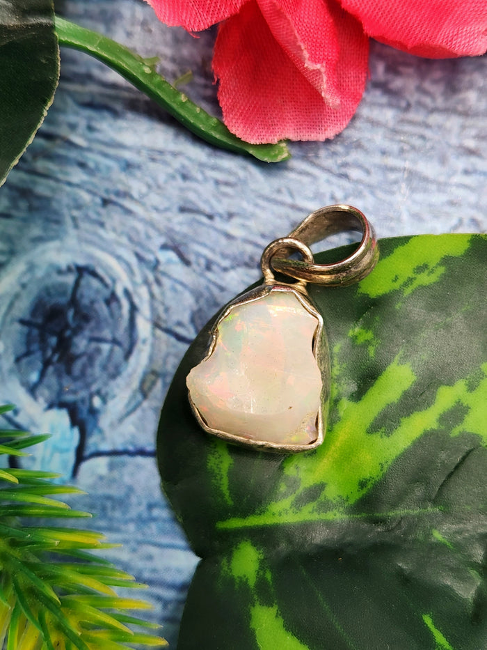 Ethiopian Opal Rough Single Stone Pendant in Silver - A Captivating Display of Nature's Brilliance