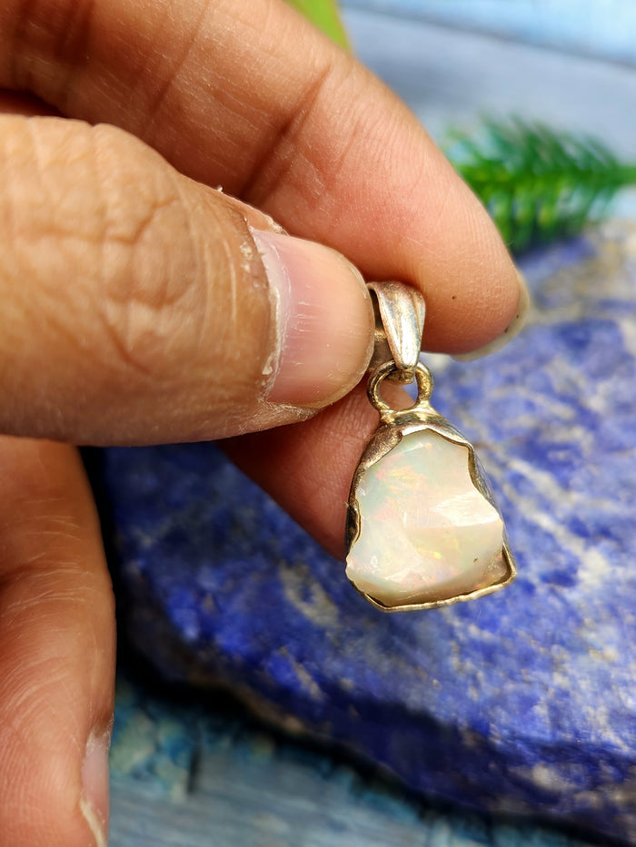Ethiopian Opal Rough Single Stone Pendant in Silver - A Captivating Display of Nature's Brilliance