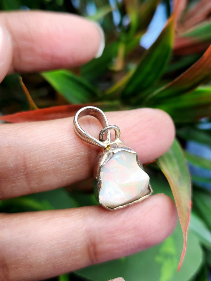 Ethiopian Opal Rough Single Stone Pendant in Silver - A Captivating Display of Nature's Brilliance