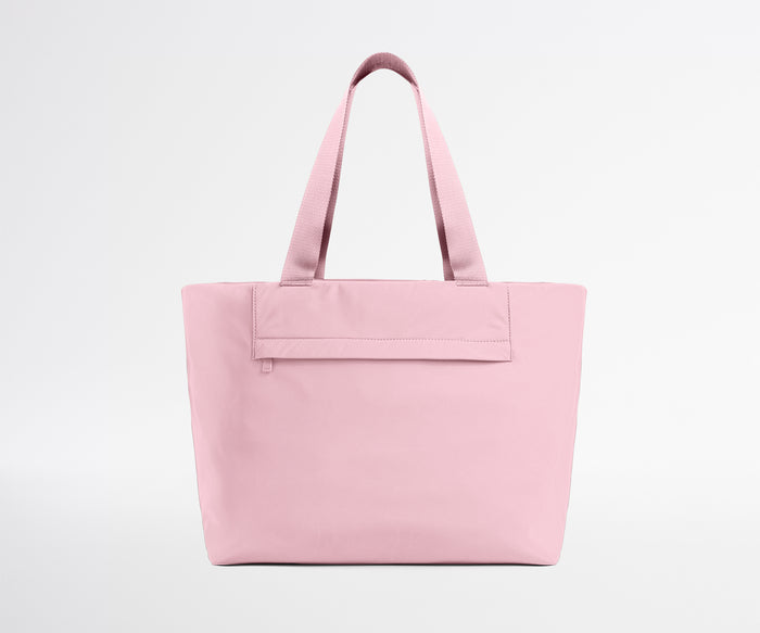 Pink tote bag on a light gray background