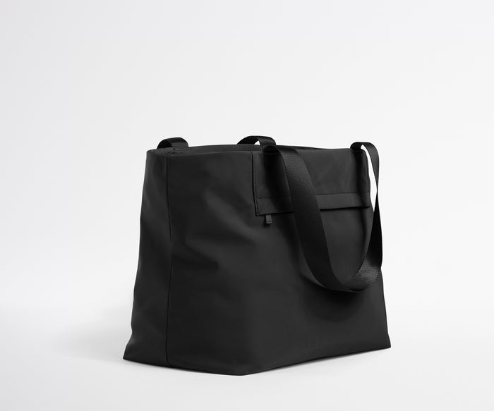 Black tote bag on a white background