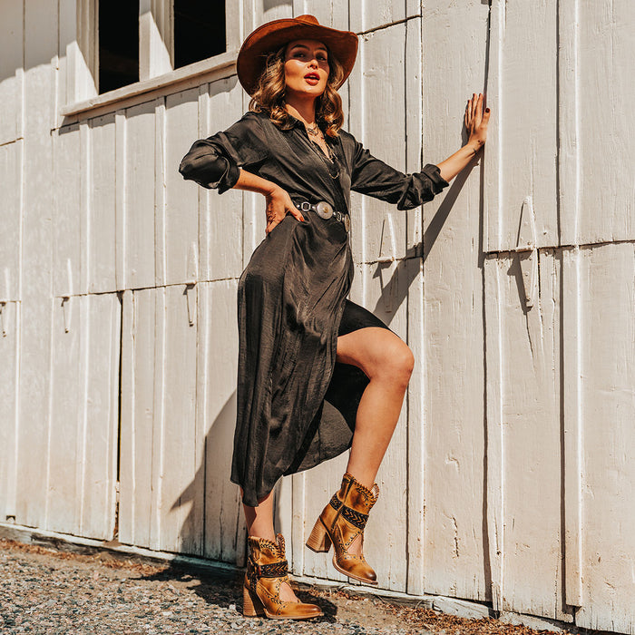 FREEBIRD women's Jetson tan western heeled bootie with vintage-inspired detailing and instep cutout lifestyle image