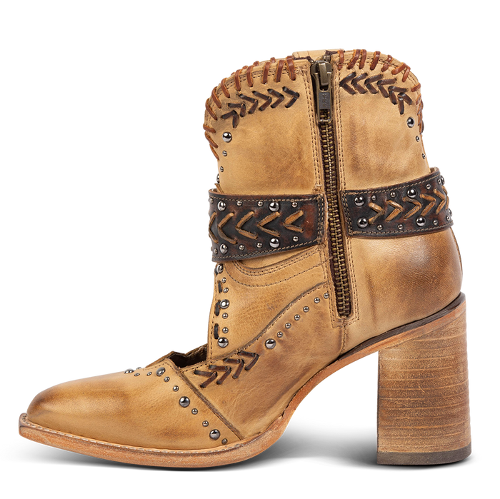 Inside view showing working brass zip closure, western detailing and a wood stacked heel on FREEBIRD women's Jetson tan bootie