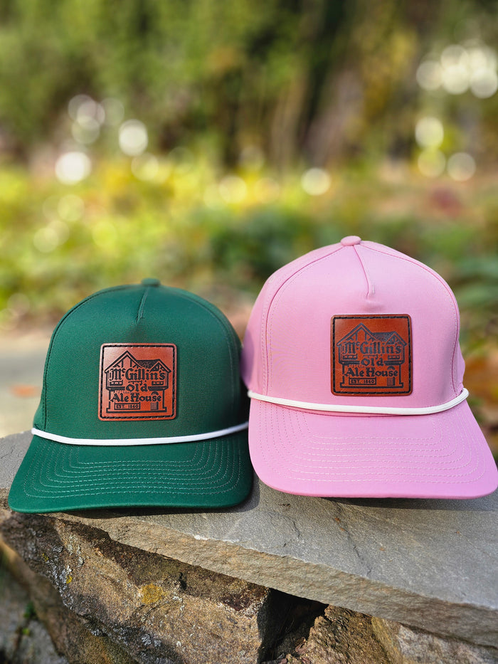 Green and Pink McGillin's Leather Patch hats with rope. Dri Fit material
