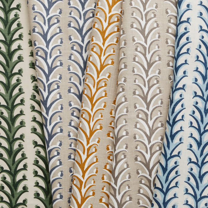 A row of folded fabric swatches, all in different colorways of the same striped branch pattern with tiny fruits.