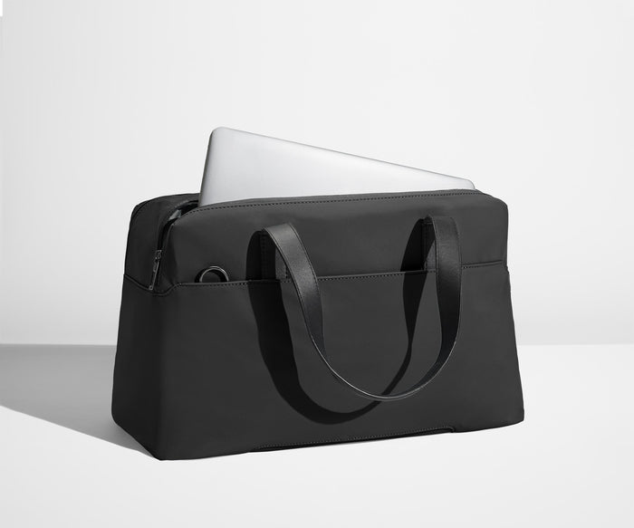 Laptop in the exterior laptop pocket that fits up to 16" devices