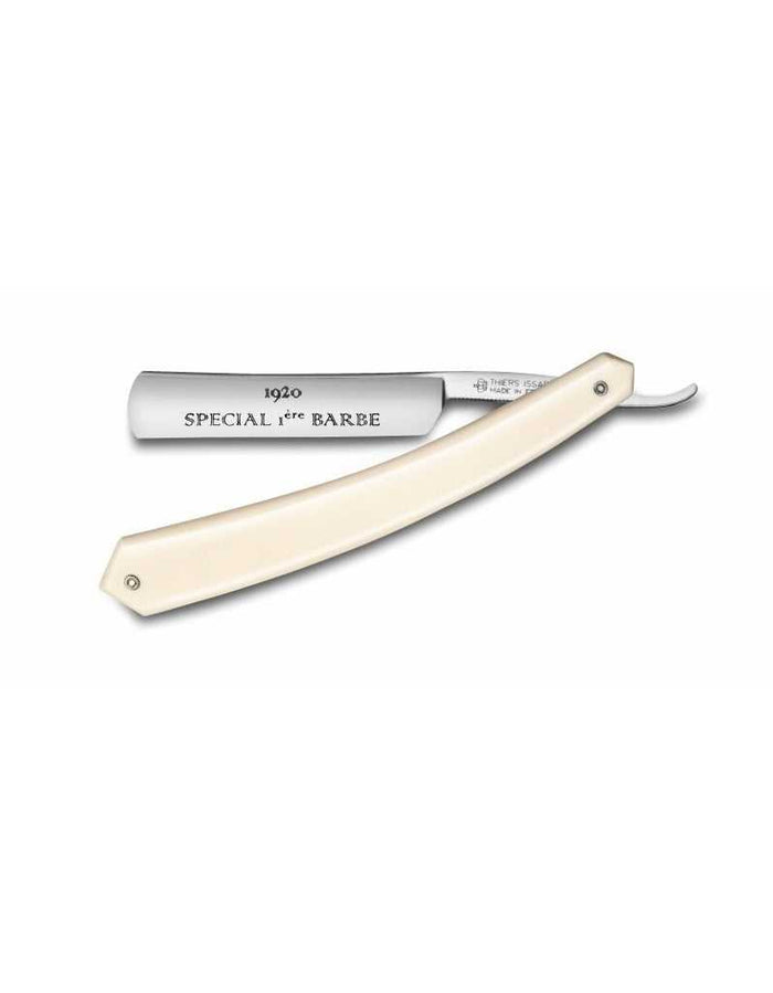 Straight razor with ivory handle, round point, 4/8 inch blade, engraved '1920 Special 1ère Barbe', in a white background.
