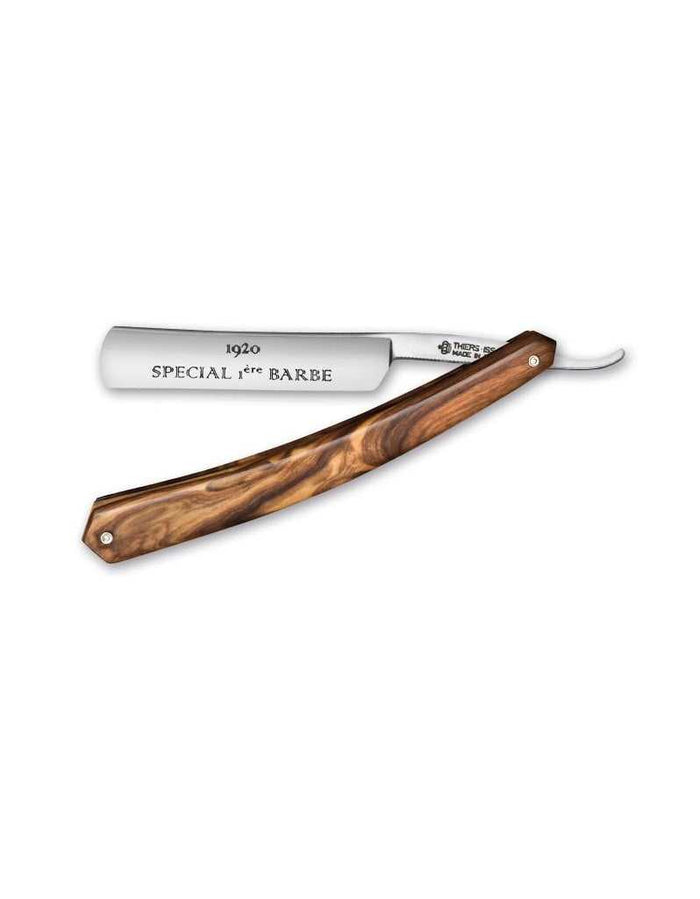 Straight razor with tortoiseshell handle, round point, 4/8 inch blade, engraved '1920 Special 1ère Barbe', on a white background.