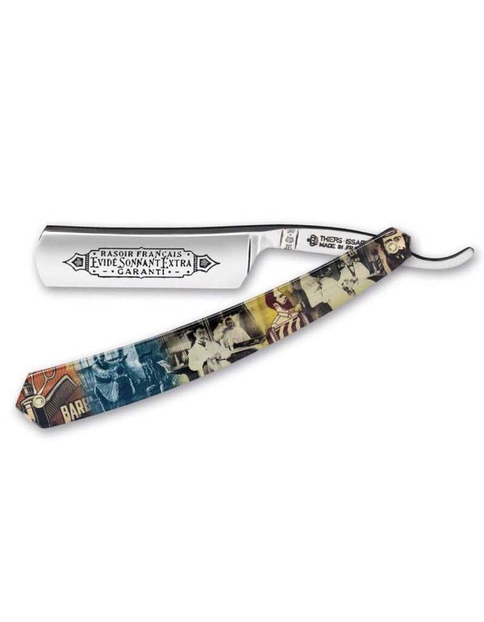 Thiers Issard straight razor with a polished carbon steel blade featuring engraved text, round point, 6/8 inch size, with a colorful vintage-themed handle