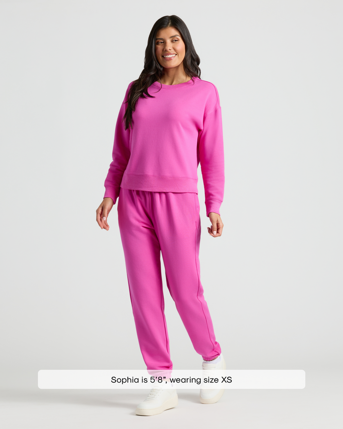 Woman in Womens Electric Fuchsia Slouch Pullover Crew & Relaxed Jogger 2-Pack.