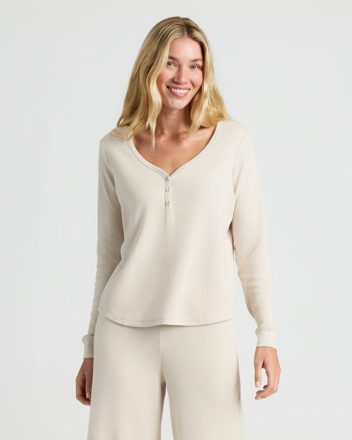 Woman models Womens Oatmeal Waffle Long Sleeve Henley & Waffle Leg Pant 2-Pack.